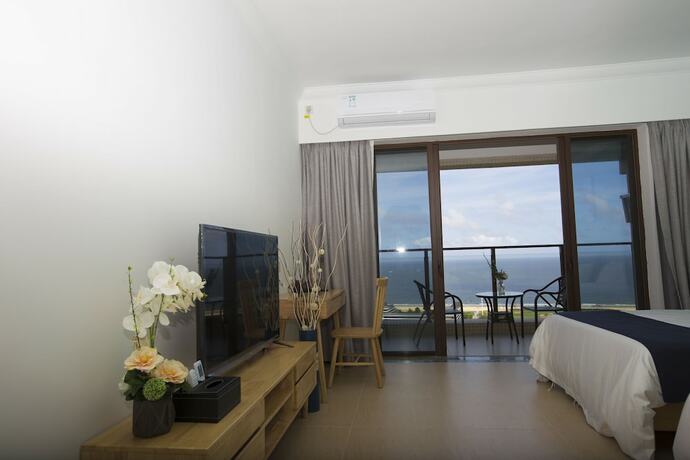 Imagen de la habitación del Poly Huanyu Guoji Apartment. Foto 7