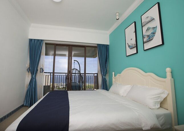 Imagen de la habitación del Poly Huanyu Guoji Apartment. Foto 8