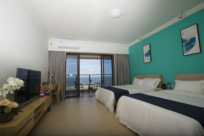 Imagen de la habitación del Poly Huanyu Guoji Apartment. Foto 9