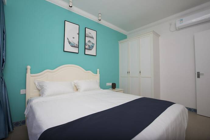 Imagen de la habitación del Poly Huanyu Guoji Apartment. Foto 10