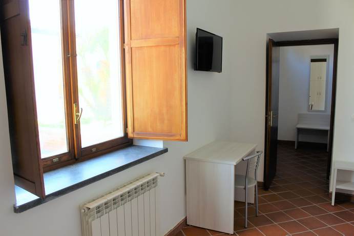 Imagen de la habitación del Pompei Hostel Suites and Breakfast Deluxe. Foto 7