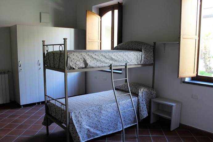 Imagen de la habitación del Pompei Hostel Suites and Breakfast Deluxe. Foto 8