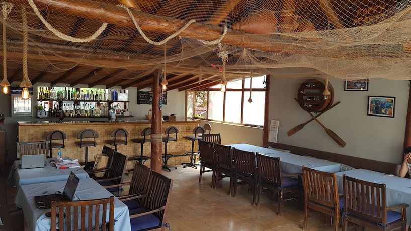Imagen del bar/restaurante del Poppy Apart Hotel. Foto 5