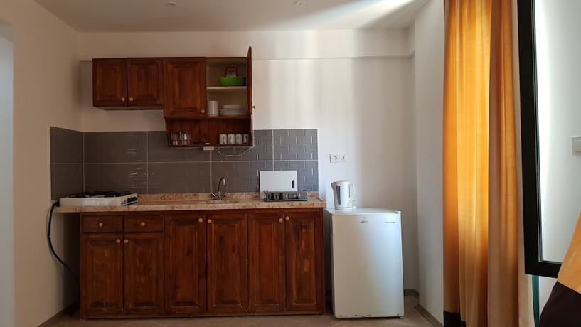 Imagen de la habitación del Poppy Apart Hotel. Foto 9
