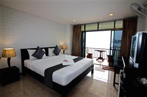 Imagen de la habitación del Pornpailin Riverside Resort. Foto 6