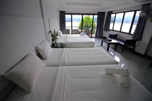 Imagen de la habitación del Pornpailin Riverside Resort. Foto 8