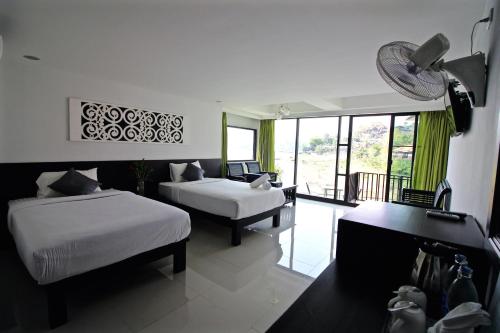 Imagen de la habitación del Pornpailin Riverside Resort. Foto 9