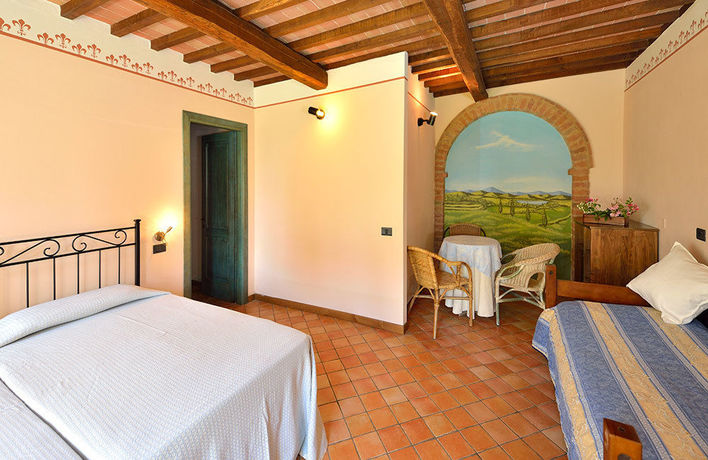 Imagen de la habitación del Porsenna Resort. Foto 2