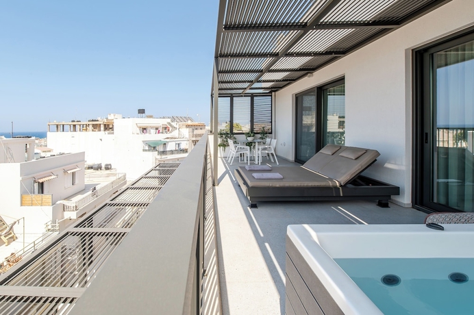 Imagen de la habitación del Porta Suites. Foto 12