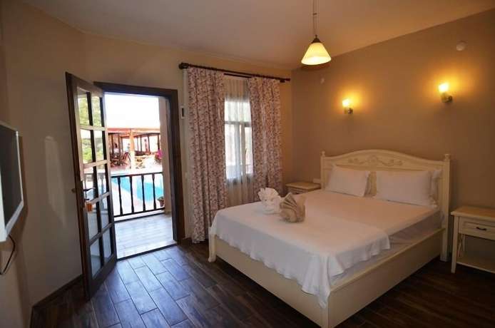 Imagen de la habitación del Portakal Hotel Selimiye. Foto 3