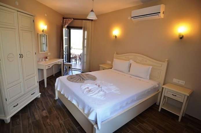 Imagen de la habitación del Portakal Hotel Selimiye. Foto 4
