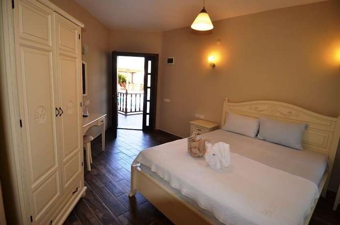 Imagen de la habitación del Portakal Hotel Selimiye. Foto 11