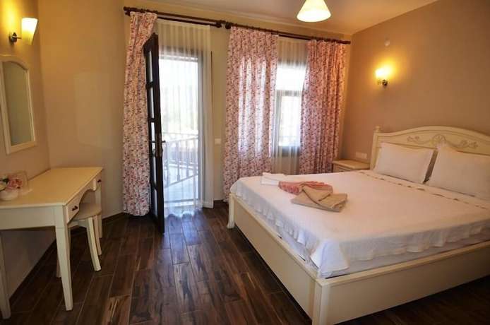 Imagen de la habitación del Portakal Hotel Selimiye. Foto 12