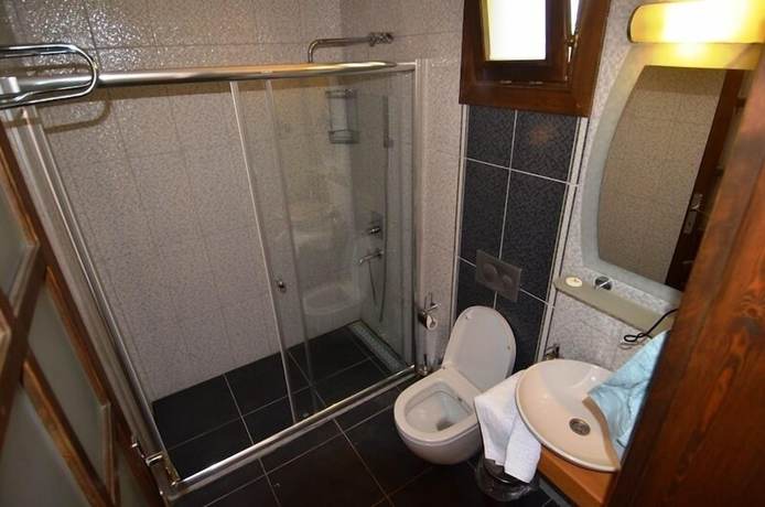 Imagen de la habitación del Portakal Hotel Selimiye. Foto 16