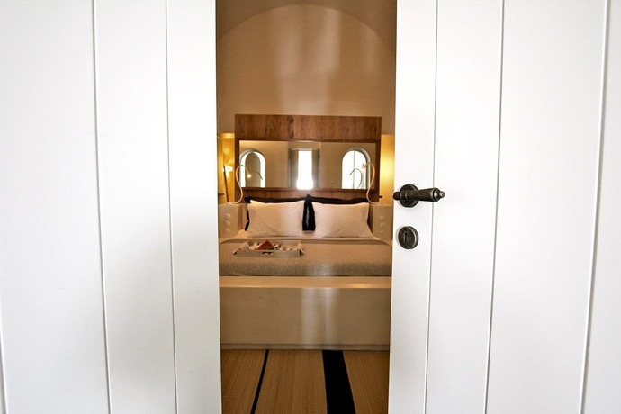 Imagen de la habitación del Porto Fira Villas. Foto 9