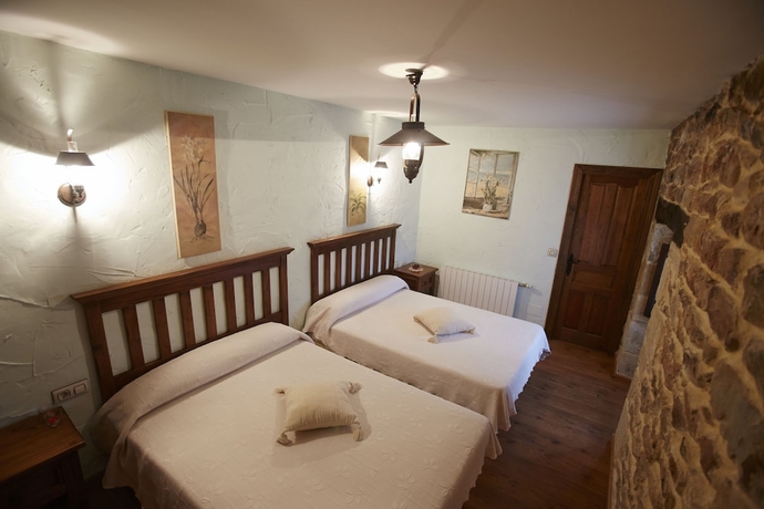 Imagen de la habitación del Posada Rural Ochohermanas. Foto 14
