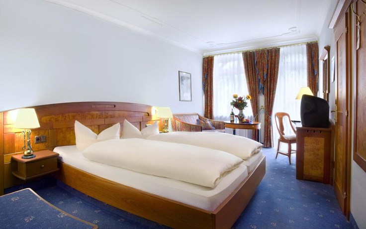 Imagen de la habitación del Post Hotel Mittenwald. Foto 11