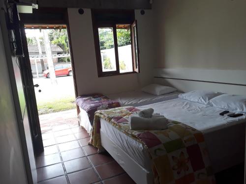 Imagen de la habitación del Pousada Vila Novo Tempo, Guaruja. Foto 5