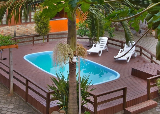 Imagen de la piscina del Pousada Village Garopaba. Foto 12