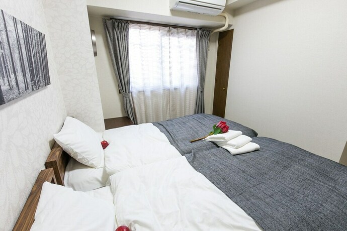 Imagen de la habitación del Pravafor Josai Apartment. Foto 17