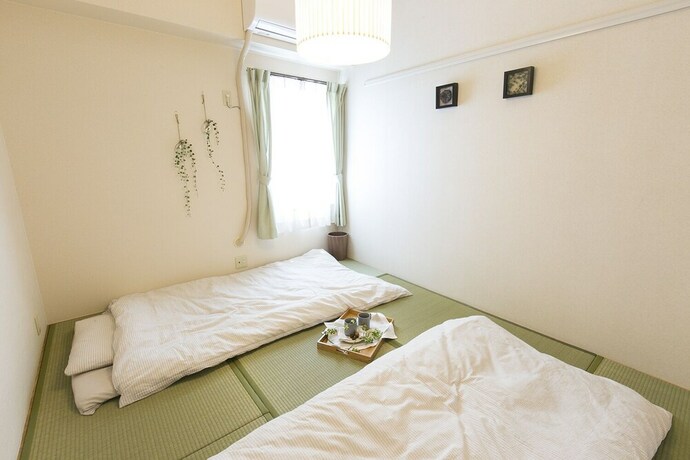 Imagen de la habitación del Pravafor Josai Apartment. Foto 35