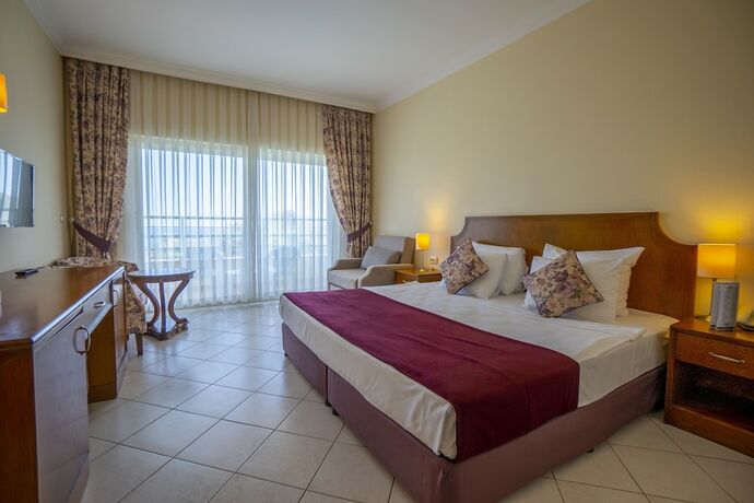 Imagen de la habitación del Presa Di Finica Hotelandsuites. Foto 18