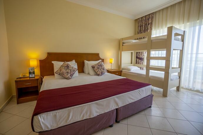 Imagen de la habitación del Presa Di Finica Hotelandsuites. Foto 19