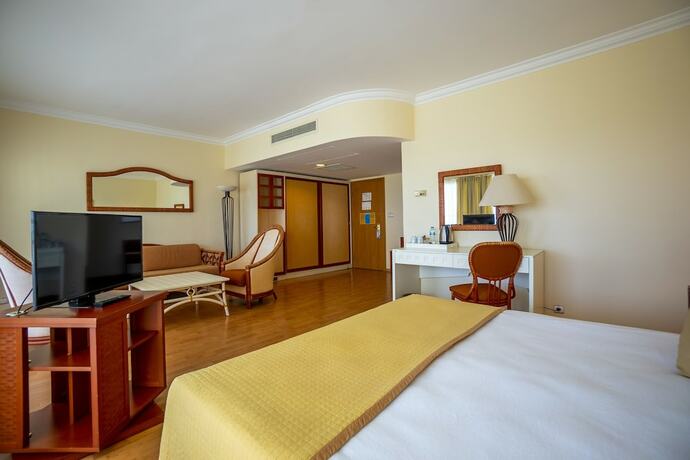Imagen de la habitación del Presa Di Finica Hotelandsuites. Foto 20