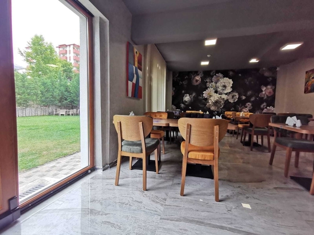 Imagen del bar/restaurante del Prime Inn Garden. Foto 3