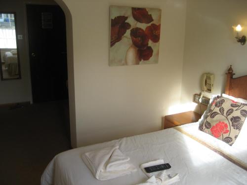 Imagen de la habitación del Priory Lodge Hotel. Foto 7