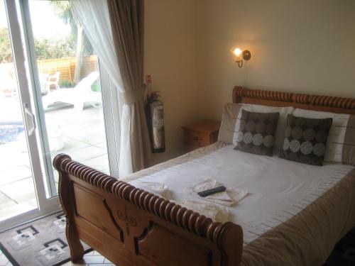 Imagen de la habitación del Priory Lodge Hotel. Foto 8