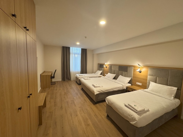 Imagen de la habitación del Promenaden Hotel. Foto 2