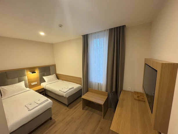 Imagen de la habitación del Promenaden Hotel. Foto 6