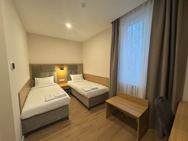 Imagen de la habitación del Promenaden Hotel. Foto 7
