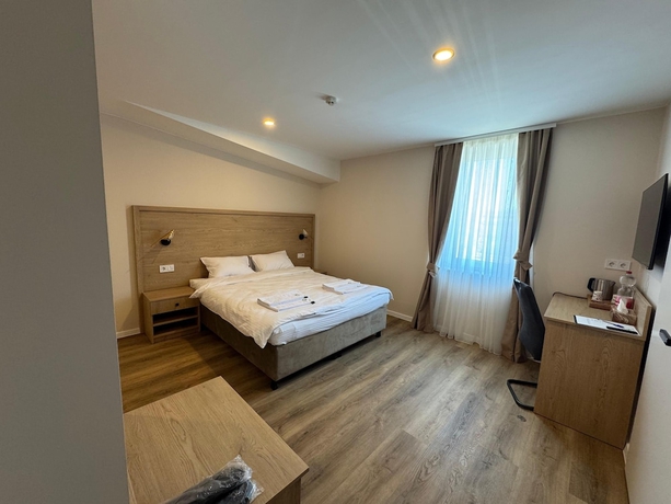 Imagen de la habitación del Promenaden Hotel. Foto 8