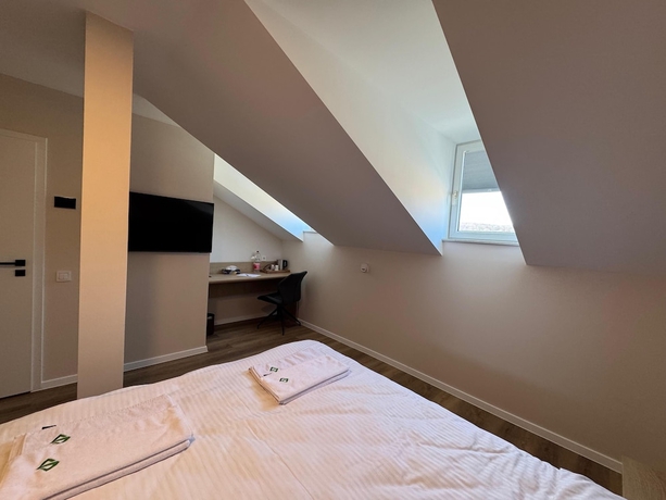 Imagen de la habitación del Promenaden Hotel. Foto 9