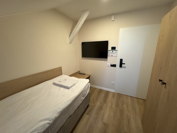 Imagen de la habitación del Promenaden Hotel. Foto 10
