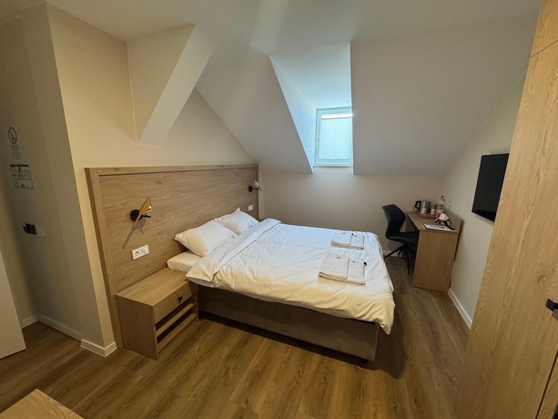 Imagen de la habitación del Promenaden Hotel. Foto 14