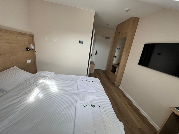 Imagen de la habitación del Promenaden Hotel. Foto 15