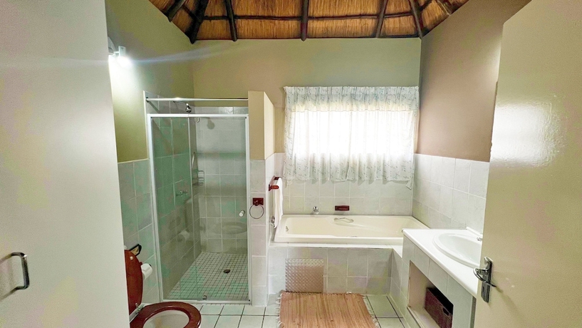 Imagen de la habitación del Protea Ridge Guest Cottages. Foto 15