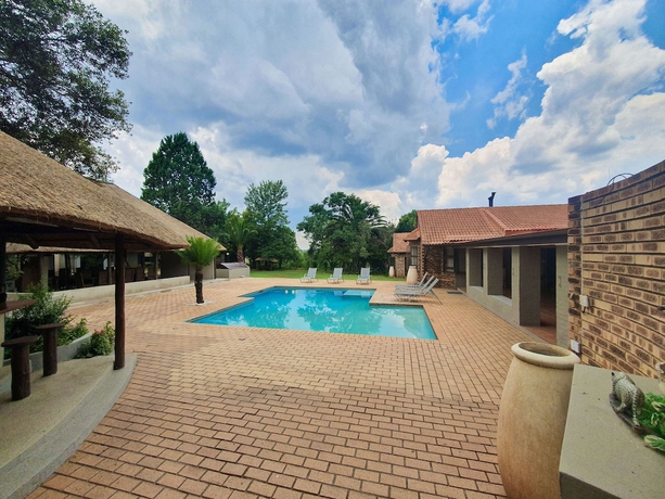 Imagen de la piscina del Protea Ridge Guest Cottages. Foto 19