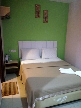 Imagen de la habitación del Pudu Inn Hotel. Foto 2