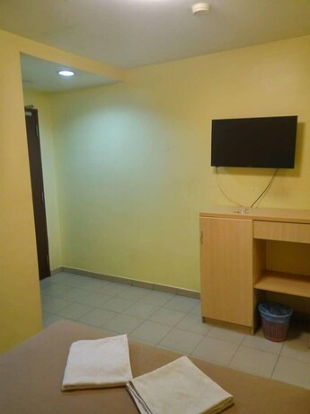 Imagen de la habitación del Pudu Inn Hotel. Foto 4