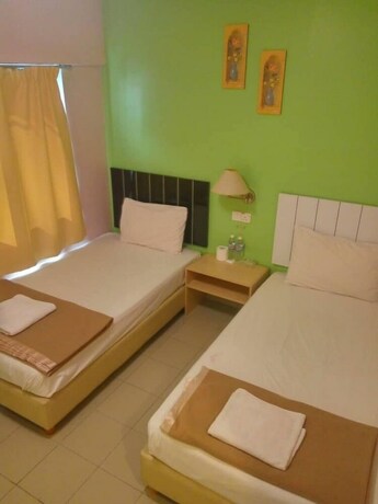 Imagen de la habitación del Pudu Inn Hotel. Foto 6