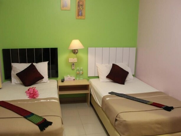 Imagen de la habitación del Pudu Inn Hotel. Foto 7