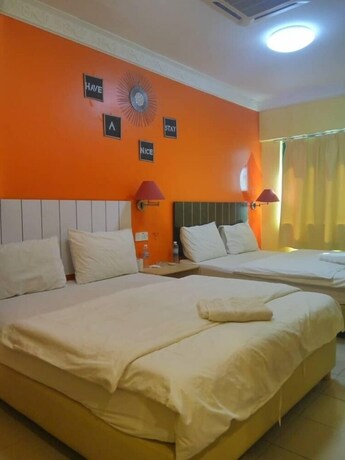Imagen de la habitación del Pudu Inn Hotel. Foto 9