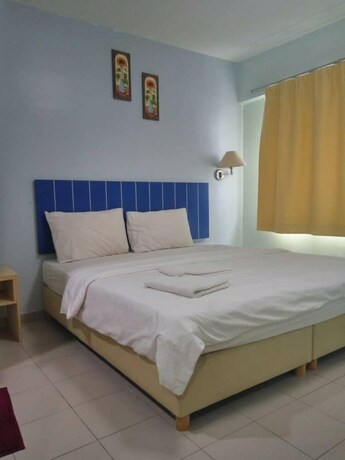 Imagen de la habitación del Pudu Inn Hotel. Foto 11