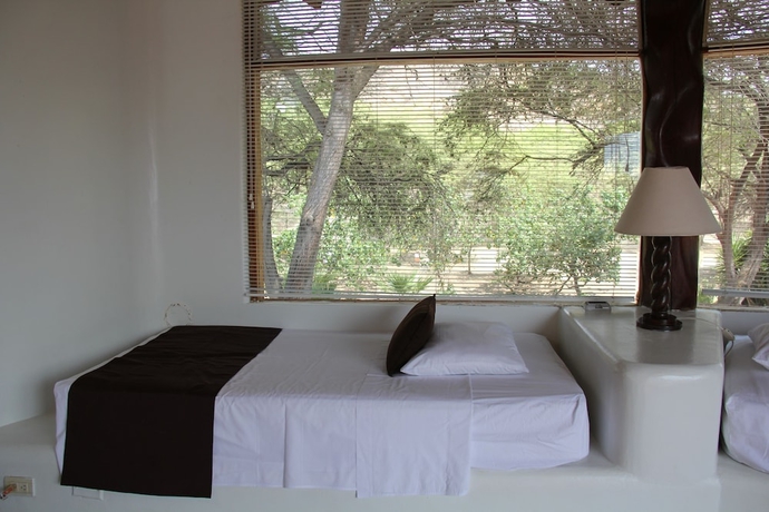 Imagen de la habitación del Punta Sal Suites and Bungalows Resort. Foto 10