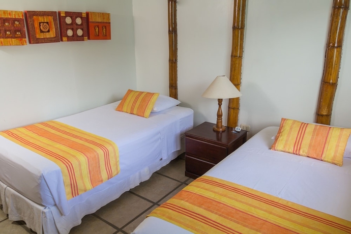 Imagen de la habitación del Punta Sal Suites and Bungalows Resort. Foto 17