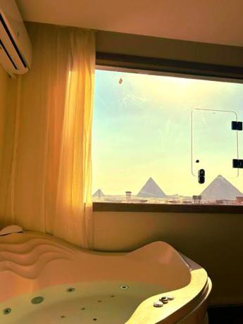 Imagen de la habitación del PyramidS GoldeN TempLE HoTeL. Foto 11